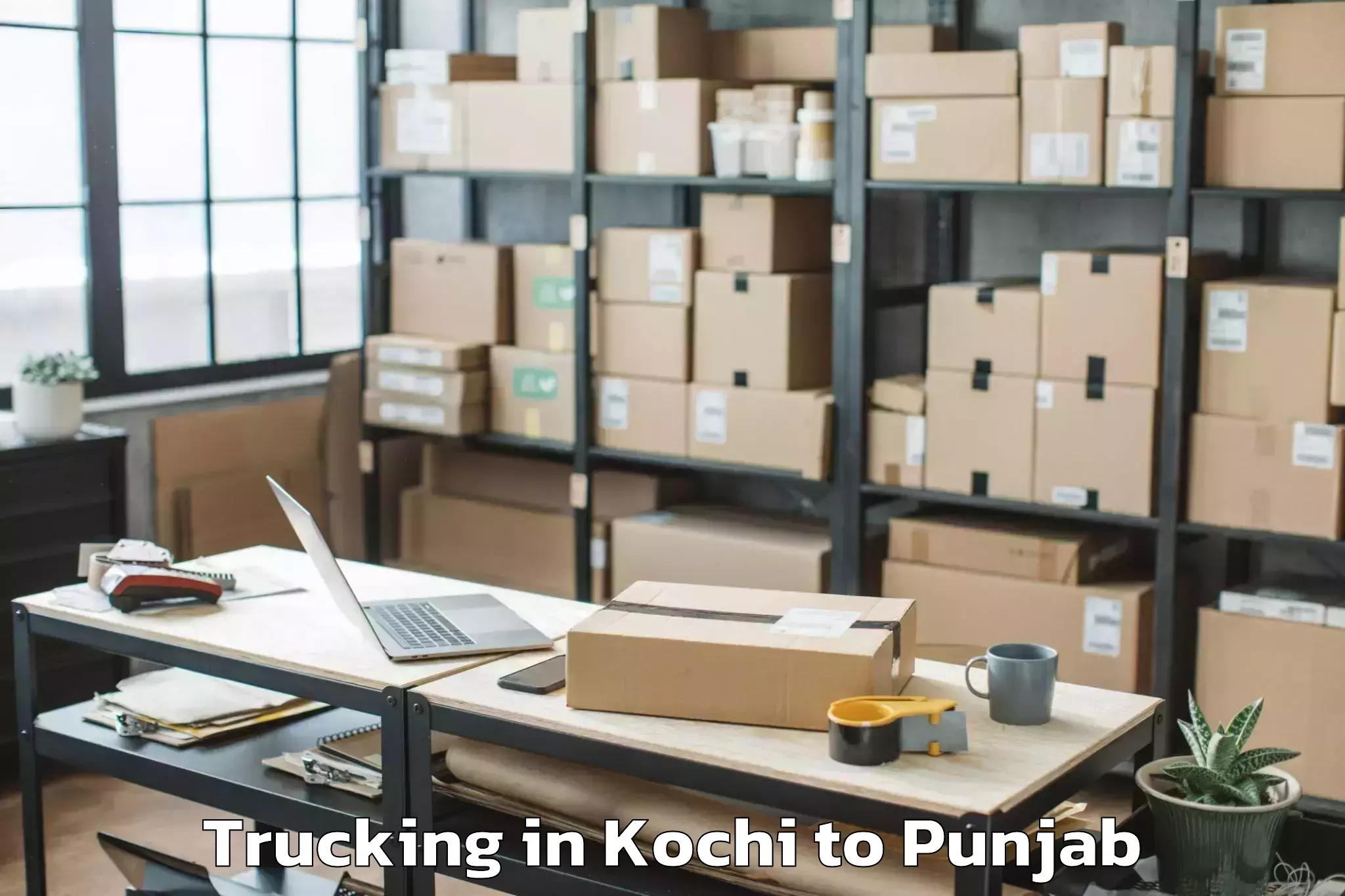 Affordable Kochi to Guru Ravidas Ayurved Universit Trucking